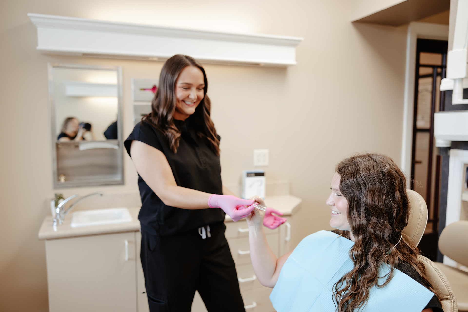 Cosmetic Dentistry Dr. Rainwater discussing treatment with a patient at Rainwater Drake Dental